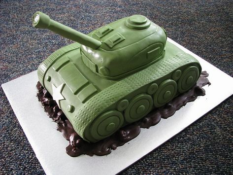 The tank cakes are starting to all look alike. For Z's cake I want to try to bundle the candles at the end of the gun so we can light them. Army Tank Cake, Army Birthday Cakes, Chocolate Piñata, Army Themed Birthday, Map Cake, Army Birthday Party, Tank Cake, Army Cake, Army Birthday Parties