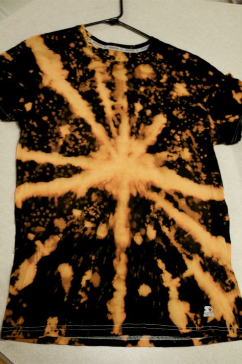 Hand-made black tie-dye shirt. Begin with one black t-shirt. Simply dilute some bleach, use rubber bands. Go crazy. Just be sure to rinse it quickly enough so the bleach doesn't eat through the shirt (it will). Make it cooler by diluting certain amounts of bleach in different bottles and using both (different shades). Black Tie Dye Shirt, How To Tie Dye, Dye Ideas, Black Tie Dye, Go Crazy, Tie Dye Designs, Tie Dye Shirt, Dye Shirt, Do Not Eat