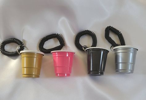 12 cups per order 2 oz shot cups *Shot cups are disposable *Customization available  Customizable shot glass bracelets are great for any occasions or even to go out parting with friends! This is perfect if you are tired of loosing your shot glass or afraid to be using the wrong shot glass. This can comfortably be around your wrist all night to ensure a safe fun night! *Recommended for Adults 21+* *Shot glass cups are plastic mini cups.* Shot Cup Bracelet, Shot Glass Bracelet, Diy Shot Glasses, Red Cup Party, Mini Cups, 21st Bday Ideas, Glass Bracelets, Red Solo Cup, Favour Bags