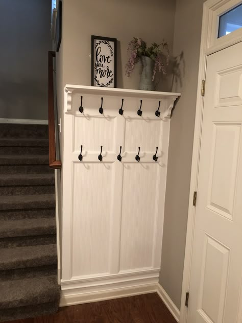 Front Entryway Hook Ideas, Foyer Hooks Entrance, Jacket Hooks Entryway, L Shape Entryway Ideas, Coat Hook Wall Ideas, Small Entryway Accent Wall Ideas, Mud Room Decor Entry Ways, Entry Hook Wall, Coat Entryway Ideas