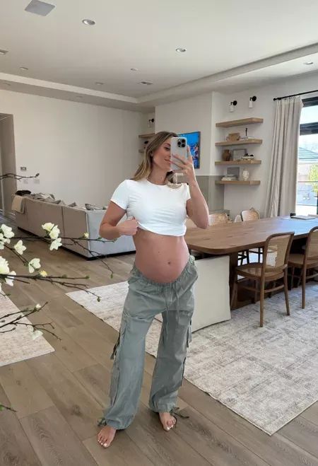 I’m never taking these cargos off throughout pregnancy! This white tee is also a maternity must-have. Wearing size medium. Tap to shop! Cargo Pants Outfit Maternity, Pregnant Streetwear, Flying Pregnant, Maternity Cargo Pants, Pregnancy Pants, Pregnant Outfit, Pregnancy Style, Baggy Cargo Pants, Cargo Pants Outfit