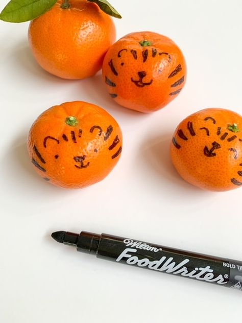 tiger mandarin oranges, best Chinese Lunar New Year party food ideas Tiger Cuties Oranges, Tiger Party Food, Chinese New Year Snacks For Kids, Tiger Party Ideas For Kids, Tiger Treats, Tiger Birthday Party Ideas, Tiger Themed Birthday Party, New Year Party Food, Tiger Activities