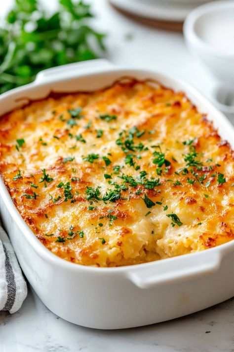 This copycat Cracker Barrel cheesy hashbrown casserole is loaded with Colby Jack and cheddar cheeses, plus cream of chicken soup and plenty of spices. Hashbrown Recipes Oven Baked, Make Ahead Breakfast Hashbrown Casserole, Christmas Hashbrown Casserole, Southern Style Hashbrown Recipes, Cracker Barrel Loaded Hashbrown Casserole, Christmas Hashbrowns, Recipes With Cheddar Cheese, Hashbrown Casserole Cracker Barrel, Cheesy Hashbrown Casserole Easy