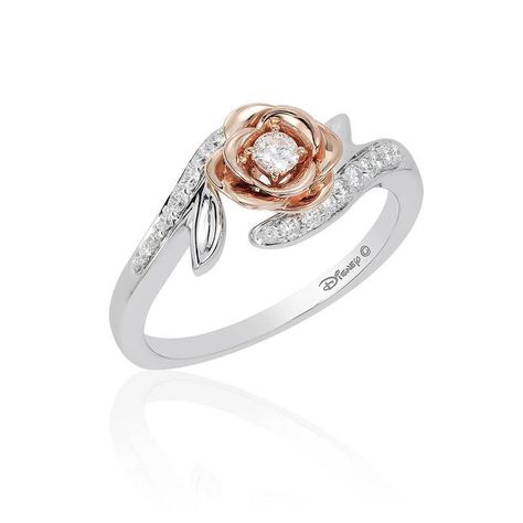 14kt white and rose gold ring. Rose gold rose with 2 leaves on the sides and a diamond in the center. Bypass surrounding rose with channel diamonds Details - 0.25cts of side diamonds, H, SI2 - 14K Rose and White Gold Ring - Disney Enchanted Collection Your Order Includes - Belle Rose Bypass Diamond Engagement Ring - Disney Enchanted Ring Box - Insured FedEx Packaging - Jewelry Appraisal All pieces are made to order with 1-5 weeks production time, please contact us for item availability. Diy Jewelry Cleaner, Disney Engagement Rings, Enchanted Disney, Enchanted Disney Fine Jewelry, Disney Belle, Disney Fine Jewelry, Rose Diamond, Diamond Fashion Rings, Jewelry Appraisal