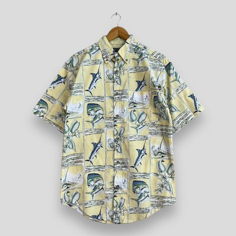 Vintage PURITAN Hawaii Shirt Small 90's Hawaiian Abstract Deep Ocean Marlin Fish Hibiscus Flower Sunwear Beach Party Shirt Button Up Size S *All measurements are taken with the garment flat on the ground. SIZE ON TAG :- Size S ACTUAL SIZE MEASUREMENT :- ARM PIT TO ARM PIT :- 20" inches BACK COLLAR TO HEM :- 31" inches CONDITION :- GREAT USED CONDITION. NO HOLES AND STAINS. REF : (29-10-2023) R136 Denim Biker Jacket, Marlin Fish, Black Pullover Sweater, Denim Workwear, Adidas Three Stripes, Deep Ocean, Hibiscus Flower, Aloha Shirt, Hawaii Shirt