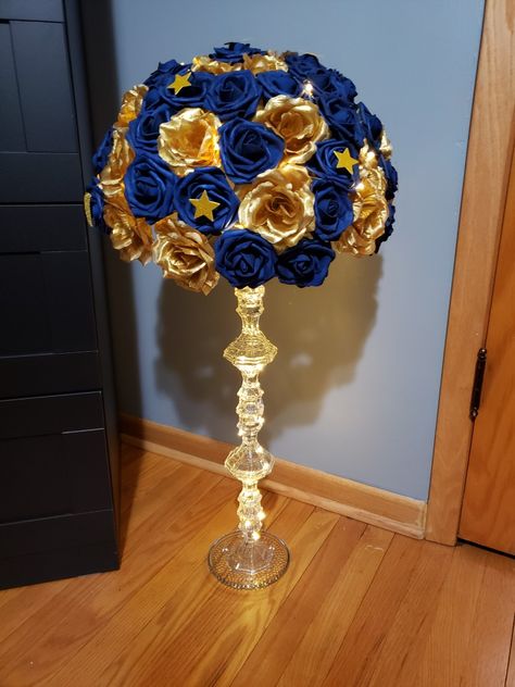 Royal Blue Black And Gold Quince, Gold And Royal Blue Centerpieces, Dark Blue And Gold Centerpiece, Navy Blue Gold Centerpieces, Royal Blue And Gold Quinceanera Tables, Royal Ball Centerpieces, Gold And Navy Centerpieces, Dark Blue Quinceanera Centerpieces, Quince Table Centerpieces Blue