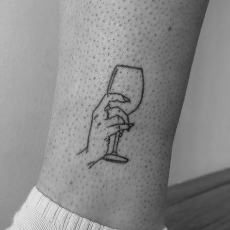 Wine glass tattoo on the back of the arm. Glass Of Wine Tattoo, Wine Glass Tattoo, Tattoo On The Back, Wine Tattoo, Tattoos 2024, Glass Tattoo, Home Objects, Favorite Tattoos, Anklet Tattoos