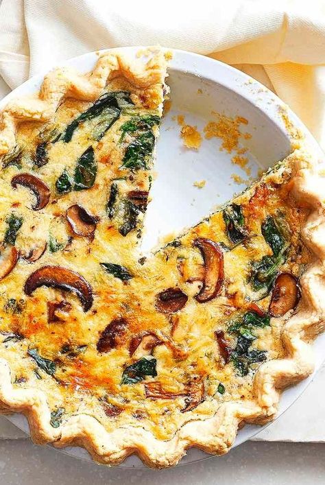 Joanna Gaines' Mushroom, Spinach & Swiss Cheese Quiche recipe looks and tastes fancy, but only requires about 30 minutes of prep. Swiss Cheese Quiche Recipe, Swiss Cheese Quiche, Mushroom And Spinach Quiche, Easy Weekend Breakfast, Joanna Gaines Recipes, Cheese Quiche Recipe, Sweet Potato Hash Browns, Mushroom Quiche, Mushroom Spinach