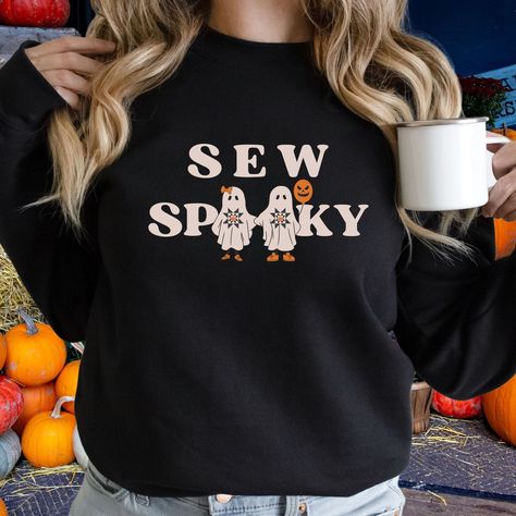 👻✨ New Arrival Alert! ✨👻⁠ By popular demand, I'm excited to introduce the Sew Spooky Ghost Friends design now in a cozy sweatshirt! Perfect for snuggling up with your latest quilting project. 🧵💛⁠ ⁠ This comfy fall favorite is available at a special price through the weekend only—grab yours today and stay warm in quilty style! 🍂💨⁠ ⁠ #SewSpooky #QuiltersGonnaQuilt #QuiltySweatshirt #FallVibes #QuiltersOfInstagram #fall sewing Spooky Crewneck, Ghost Quilt, Quilt Shirt, Spooky Sweatshirt, Halloween Sewing, Colorful Quilt, Sewing Shirts, Quilt Retreat, Cute Quilts