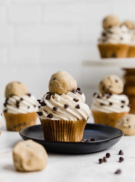 These Cookie Dough Cupcakes are made with a melt-in-your-mouth moist and soft chocolate chip cookie dough cupcake, topped with cookie dough frosting (made with heat-treated flour) and decorated with an edible cookie dough ball! Cookie Dough Cupcakes Recipe, Cookie Dough Ball, Cookie Dough Cupcake, Kevin And Amanda, Soft Chocolate Chip Cookie, Vegan Chocolate Chip Cookie Dough, Chocolate Chip Cookie Dough Cupcakes, Cookie Cupcakes, Cookie Dough Ingredients