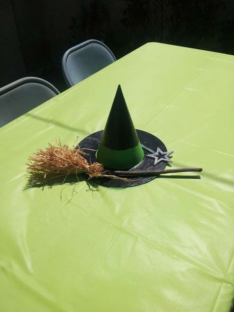 Wicked/Wizard of OZ Birthday Party Ideas | Photo 3 of 25 | Catch My Party Wizard Of Oz Table Centerpieces, Wicked Musical Birthday Party, Wizard Of Oz Centerpieces, Wicked Birthday Party, Wizard Of Oz Crafts, Camping Theme Wedding, Emerald City Party, Wizard Of Oz Party Ideas, Wizard Of Oz Birthday Party