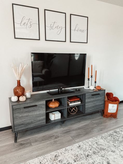 Fall Decorations Tv Stand, Boho Fall Decor Tv Stand, Decor Around Tv Stand Living Rooms, Home Decor Tv Stand, Simple Autumn Home Decor, Decor Next To Tv Stand, Fireplace Stand Decor, Tv Stand Decor Candles, Fall Decor Living Room Tv Stand