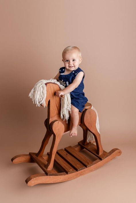 Little boy on his rocking horse first birthday pictures Rocking Horse Photo Shoot, First Birthday Boy Pictures, Kids Rocking Horse, Baby Rocking Horse, First Birthday Boy, First Birthday Pictures, Wooden Rocking Horse, Horses Theme, Horse Birthday