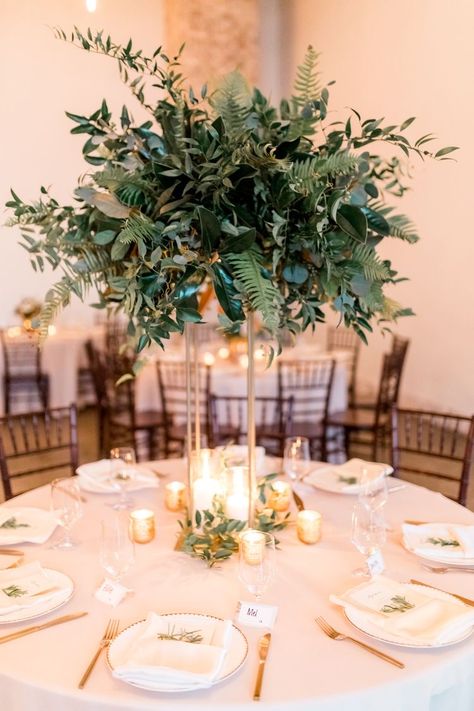 Wedding Table Decorations Greenery Floral Arrangements, Potted Greenery Wedding, Wedding Centerpieces Eucalyptus Round Table, Harlow Stand Arrangements, Tall Eucalyptus Centerpiece, Gold Harlow Stand Centerpiece, Gold And Greenery Wedding Centerpieces, Foliage Wedding Centerpieces, Large Greenery Arrangements