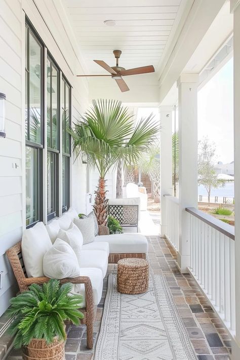 coastal front porch with potted palm tree and woven sofa with white cushions Florida Porch Ideas, Beach House Porch Decor, Beach Cottage Porch, Southern Porch Decorating Ideas, Coastal Porch Ideas, Tropical Front Porch, Beach Front Porch, Coastal Front Porch Ideas, Coastal Front Porch