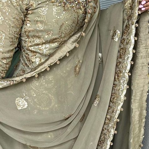 Rajpreet Nagra on Instagram: "OLIVE This beauty calls out royal. The top is done on a georgette base self embroidered fabric. Hand embroidery around neckline, end of sleeve and finished off with a ready border on the bottom. The lengha is done on a self embroidered booti fabric. The dupatta is done with a self embroidered fabric, we added gold pearls to finish off the edges for that regal look! Available in any size, any color and many styles! Please email: rajikhairaofficial@gmail.com for f Trending Saree, Embroidered Fabric, Gold Pearl, Indian Fashion, Hand Embroidery, The Top, Embroidery, Fabric, Gold