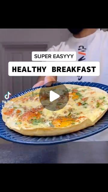 Daily Fitness Tips & Nutrition on Instagram: "One of the easiest healthy breakfasts, using NO OIL either! basically like a breakfast pizza using eggs and a tortilla wrap👌🏽

Follow  @theplanetofitness for all the best high protein recipes in one place!

By @jalalsamfit 

In a baking pan:
Wholemeal or plain tortilla
4 eggs or egg whites
Chilli pepper
Chopped tomato
Chopped spinach
Season to your liking i did
Salt, pepper and paprika
Mozzarella cheese

Bake in the oven for just 10mins at 180 celsius⚡️

Around 500 cals
36P / 32C / 22F
(reduce fat by using egg whites)

Been enjoying making easy and creative meals lately so will be posting more of these for sure, hope you’re having a great week!✌🏽
.
.
.
.
.

#healthybreakfast #eggs #breakfastideas #healthyfood #healthyrecipes #healthyeating # Healthybreakfast Eggs, Creative Meals, Tortilla Wrap, Cheese Bake, Healthy Breakfasts, Tortilla Wraps, Protein Recipes, Chopped Spinach, Chilli Pepper