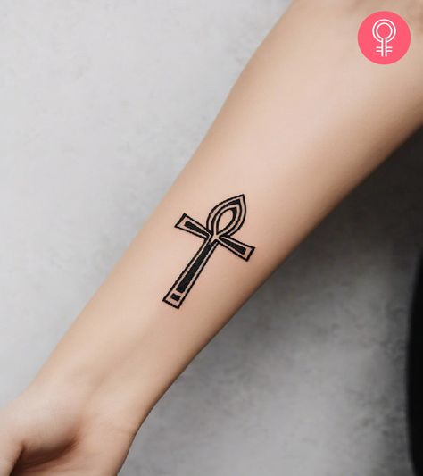 Ankh tattoos symbolize life, well-being, and the afterlife. Embrace those themes by inking this unique ancient Egyptian symbol on your body! Simple Ankh Tattoo, Ankh Minimalist Tattoo, Ankh Tattoo Design Beautiful, Ankh Tattoo Back Of Neck, Unique Ankh Tattoo, Ankh Tattoos, Four Leaf Clover Tattoo, Ankh Tattoo, Olive Branch Tattoo