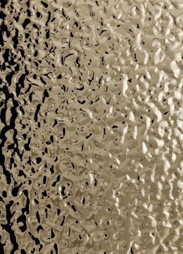 In this image, the gold foil has raised bumps and ridges that show texture. Inox Texture, Water Ripple Sheet, Mirror Texture, Stainless Steel Texture, Texture Metal, Ceiling Texture, Stainless Steel Sheet, Verre Design, Steel Panels