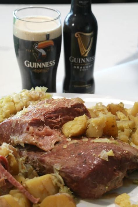 Super easy Crock Pot Guinness Corned Beef and Cabbage Recipe! Perfect for St Patrick Day the slow cooker does all the work! Celebrate St. Paddy with friends and a bit of Irish beer! #crockpot #slowcooker #guiness #stpattyday #stpatricksday #cornedbeef Cornbeef And Cabbage Crockpot, Guinness Corned Beef, Cabbage Slow Cooker, Crockpot Cabbage Recipes, Corned Beef Recipes Slow Cooker, Corned Beef And Cabbage Recipe, Guinness Recipes, Beef And Cabbage Recipe, Crock Pot Corned Beef