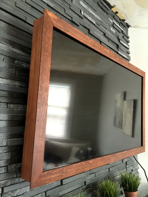 DIY $40 Wood TV Frame {works for TVs that tilt and rotate, too!} | Beginning in the Middle Wood Tv Frame, Frame Around Tv, Cornice Tv, Tv Over Fireplace, Tv Frame, Wood Tv, Diy Tv, Wall Mounted Tv, Ideas Living