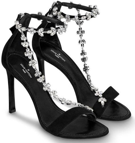 Combining velvet-black suede baby goat leather with brilliant strass, the Black Bird high-heeled sandal is a jewel-like design which adorns the feet with sparkling chains of Monogram Flowers Zapatillas Louis Vuitton, Louis Vuitton Heels, Hak Tinggi, Louis Vuitton Shoes Heels, Fancy Heels, Fashion Shoes Heels, Shoes Heels Classy, Louis Vuitton Black, Fancy Shoes