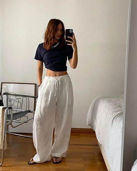 8 Summer Trouser Outfits That Are Easy, Stylish and Cool | Who What Wear Summer Trousers Outfits, Trousers Outfit Summer, Linen Trousers Outfit, White Linen Trousers, Linen Pants Outfit, Summer Wardrobe Staples, Trouser Outfit, Summer Trousers, Trouser Outfits