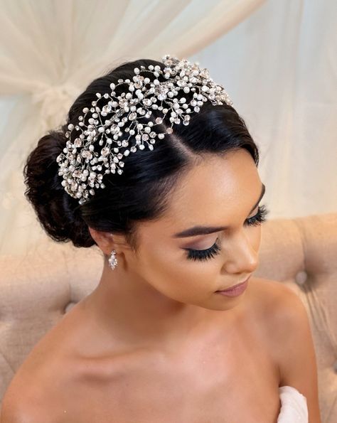 Our elegant yet bold bridal headband features scattered bursting crystals cascading throughout. A luxurious bridal headpiece with a soft yet dramatic design that will suit any wedding hairstyle. This captivating modern wedding hair accessory is versatile as a headband or tiara. Available in all crystal, or crystal with pearl. -Genuine crystals -Approximately 3.4in wide x 15in long (8.6 cm x 38.1 cm) -Rhodium plated, non-tarnish finish for brilliance -Loops at each end for securing Shown with ear Modern Bridal Tiara, Wedding Hair Bands Headbands, Bridal Headgear, Modern Wedding Hair, Bridal Headband Veil, Headband Veil, Hunter Wedding, Makeup Images, Wedding Hairband