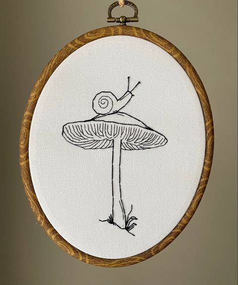 #handembroidery #embroidery #originalart #fibreart #snailembroidery #mushrooms #snails #stitchart #handstitched Snail Mushroom Embroidery, Mushroom Embroidery Pattern Simple, Snail Embroidery Simple, Snail Embroidery Pattern, Modern Embroidery Ideas Free Pattern, Mushroom Embroidery Simple, Embriodary Design Ideas, Mushroom Embroidery Pattern, Embroidery Mushrooms