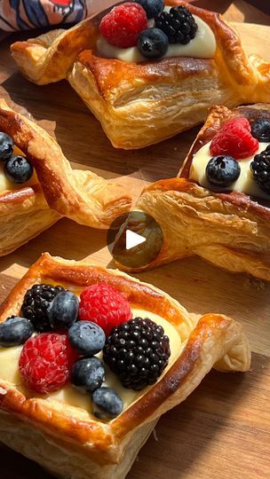 4.2K views · 2.1K reactions | Vanilla custard and berry danishes 🥰🍓🫐

I was so so so happy with this recipe!! Vanilla custard is my favorite in anything, donuts, danishes, trifles…you name it! Pairing it with fresh berries and puff pastry is truly the crème de la crème 🤭

Ingredients:
Pastry cream:
4 egg yolks
2 cups milk 
1 1/2 tbsp vanilla or 1-2 vanilla beans 
1/2 cup sugar 
3 tbsp corn starch 
2 tbsp butter 
Store-bought puff pastry dough (or homemade!)
Fresh berries 

Directions:
- Add milk and vanilla to a sauce pan on medium heat and heat through until it just starts to simmer. Do not let boil!
- While milk heats, mix egg yolks, cornstarch and sugar. It will look sandy, but if you keep mixing it becomes smooth. 
- Temper the egg mixture by slowly pouring in the hot milk, mixing Puffy Pastry, Lebanese Sweets, Puff Pastry Recipes Dessert, Happy Hour Appetizers, Puff Dessert, Pastries Recipes Dessert, Puff Pastry Desserts, Afternoon Tea Recipes, Puff Pastry Dough