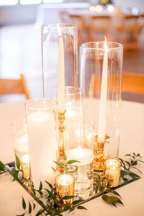 Elegant and romantic gold wedding reception centerpiece, including candles, mirrors, and stunning greenery at this Knights of Columbus Wedding in Savannah GA by Francesca Caputo Photography Wedding Centerpiece Mirror Base, Wedding Table Mirror Centerpieces, Just Candles Centerpiece, Wedding Centerpieces Pillar Candles, Centerpieces Wedding Mirror, Wedding Mirror Centerpieces, Simple Wedding Candle Centerpieces, Elegant Old Hollywood Wedding, Wedding Centerpieces With Gold Accents