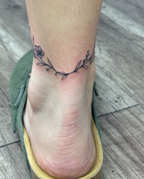 Super cute wrap around ankle vine! #ankletattoo #wraparound #wraparoundtattoo #wraparoundankletattoo #tattoos #linework Vine Cuff Tattoo, Ankle Tattoo Wrap Around, Wrap Around Ankle Tattoos, Wrap Around Tattoo, Cuff Tattoo, Ankle Tattoo, Wrap Around, Tatting, Art Tattoo