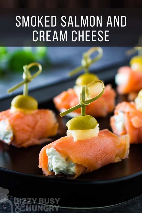 Smoked Salmon and Cream Cheese Roll-ups - This easy recipe only takes 10 minutes to make with just four ingredients! Perfect finger food for your next party or gathering and a delicious low carb bite! The smoked salmon paired with the creamy goodness of the chive cream cheese, briny bite from the olive, and lemony tang is the perfect combination rolled up in a bite! #smokedsalmon #canape #appetizer #salmonappetizer #dizzybusyandhungry Keto Pinwheels, Salmon With Cream Cheese, Smoked Salmon Recipes Appetizers, Smoked Salmon Bites, Catering Appetizers, Smoked Salmon And Cream Cheese, Smoked Salmon Canapes, Salmon And Cream Cheese, Smoked Salmon Appetizer