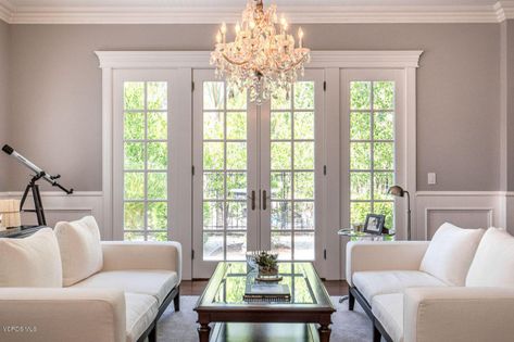 Symmetrical living room with chandelier and french doors Double French Doors Living Room, Living Room With Chandelier, Symmetrical Living Room, Living Room With French Doors, Room With Chandelier, French Doors Living Room, Backyard Door, White Family Rooms, Room With French Doors