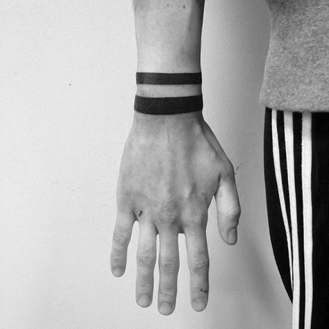 Top 43 Black Band Tattoo Ideas [2021 Inspiration Guide] Black Band Tattoo, Wrist Band Tattoo, Band Tattoos For Men, Small Wave Tattoo, Tatuagem Masculina Pequena, Cool Wrist Tattoos, Band Tattoo Designs, Armband Tattoo Design, Men Tattoos