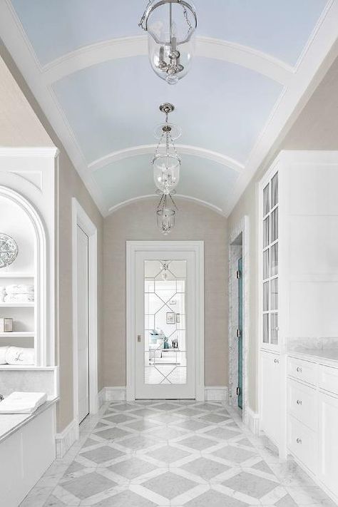 Glass Bathroom Door, Vault Ceiling, Barrel Vault, Blue Ceiling, Barrel Ceiling, White Molding, Marble Tile Floor, Patterned Floor Tiles, Jar Lanterns