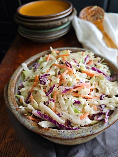 This Old Fashioned Creamy coleslaw recipe is full of classic charm and wholesome goodness. With shredded cabbage and carrot in a creamy, tangy dressing, this homemade coleslaw is deliciously satisfying. Vinegar Coleslaw Dressing, Sweet And Spicy Coleslaw, Oil And Vinegar Coleslaw, Creamy Coleslaw Recipe, Spicy Vinegar, Homemade Coleslaw Dressing, Spicy Coleslaw, Vinegar Coleslaw, Coleslaw Dressing