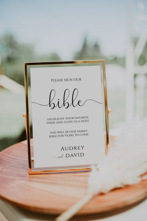 The Wedding Bible Guest Book Sign is perfect for your wedding! This bible guest book sign features a minimalist design that will make it one of a kind. Not only is this bible guest book sign beautiful, but it's also practical. This bible guest book sign makes a great addition to any wedding reception or ceremony.Comes in three sizes: 4x6 inch, 5x7 inch and 8x10 inch. All are easily editable and totally customizable.With this template you can change the fonts, text and colors. With each purchase I provide nine video tutorials on how to edit your items in Templett. There is NO software to download and NO fonts to install.TRY BEFORE YOU BUY - FOR FREE!Copy this link into your web browser to try out this template right now!https://templett.com/design/demo/ellawinstonpaperie/22715398,22715384,2 Signing Board For Wedding Guest Books, Guest Book Bible Sign, Ideas For Passed Loved Ones At Wedding, Wedding Gestures For Guests, Washing Each Others Feet Wedding, Memorable Table At Wedding, Favor Wedding Ideas, Wedding Ideas For Guests To Do, Wedding Arrival Ideas