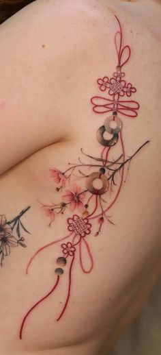 Asian Rib Tattoo, Chinese Cultural Tattoo, Asian Back Tattoos For Women, Chinese Matching Tattoos, Chinese Inspired Tattoos For Women, Japanese Tattoo Designs For Women, Japanese Style Spine Tattoo, Korean Style Tattoo Ideas, Chinese Charm Tattoo Design