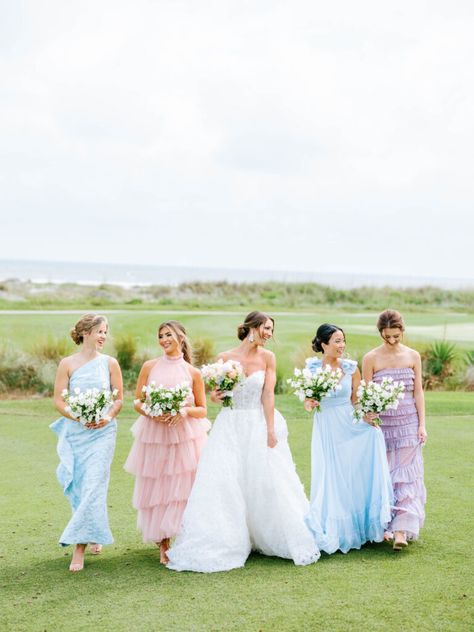 Pastel dreams for this mix matched bridesmaids look in South Carolina. Purple, Blue & Pink bridesmaids dresses with different prints & texture. Summer Wedding Colors Pastel, Pastel Wedding Bridesmaids Dresses, Pink And Blue Bridesmaids, Pink And Blue Bridesmaid Dresses, Mix And Match Bridesmaid Dresses Pink And Blue, Pastel Blue And Purple Bridesmaid Dresses, Pink Purple Blue Bridesmaids, Blue Purple Pink Wedding Bridesmaid Dresses, Carolina Blue And Pink Wedding