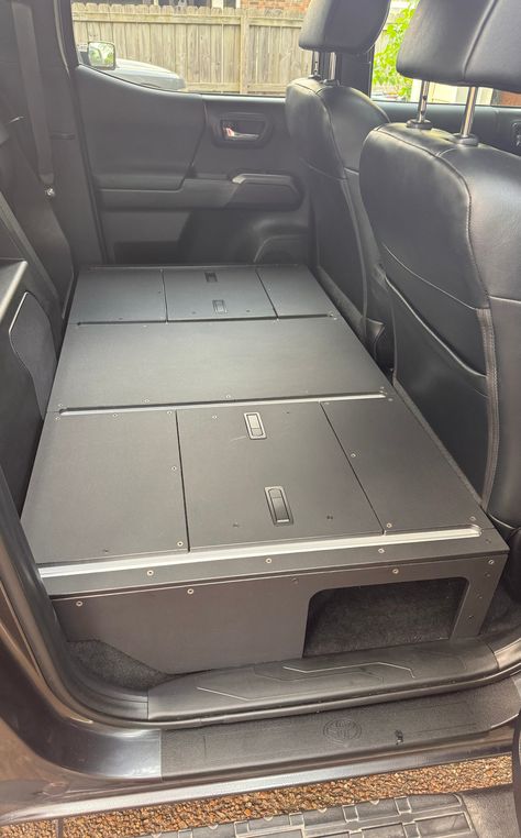 CargoKits Seat Delete This is a storage platform designed to replace either the 60% rear seat, or the full rear seats of a 2016-2023 Toyota Tacoma. The base platform has accessory rails built in for securing your gear or attaching modular drawers and kitchen slide outs. The in floor storage compartments are accessible through the access hatches. Features: Aluminum Construction for light weight without sacrificing strength. No plywood, HDPE sheets replace coated plywood that can eventually wear t 1st Gen Tacoma, Ram Interior, Rear Seat Delete, Tacoma Bed Rack, Tacoma 3rd Gen, Truck Storage Box, Shtf Vehicle, Truck Interior Accessories, Suv Storage