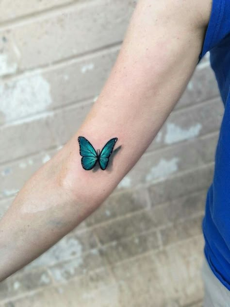 Amazing blue morpho, 3d realistic tattoo done by Kaitlin Dutoit at Ink Snob Studio in Glendale, AZ. Blue Morpho Butterfly Tattoo, Morpho Butterfly Tattoo, Tato 3d, Realistic Butterfly Tattoo, 3d Butterfly Tattoo, Blue Butterfly Tattoo, Butterfly Tattoo Meaning, Bright Tattoos, Butterfly Tattoos For Women