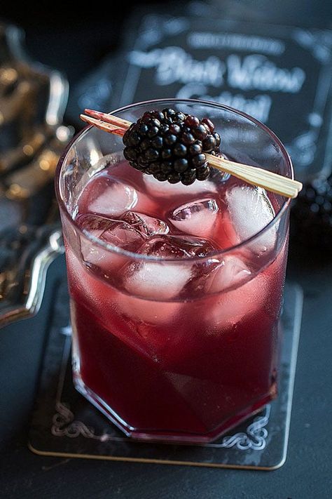 16 Easy Halloween Punches We’re Completely Obsessed With #refinery29 https://www.refinery29.com/en-us/2015/10/95204/halloween-punch-bowl-party-ideas#slide-12 Black Widow Cocktail, Halloween Punch Bowl, Easy Halloween Cocktails, Cocktail Recipes For A Crowd, Halloween Punch Recipes, Halloween Bridal Showers, Alcoholic Punch Recipes, Halloween Drinks Alcohol, Halloween Punch