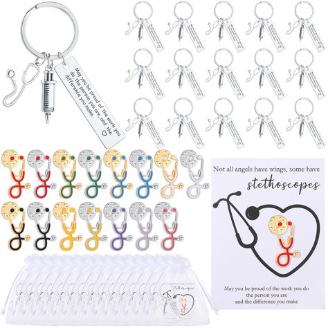 PRICES MAY VARY. Generously Quantified Set: the nurse gift set includes 15 thank you cards, 15 organza bags, 15 stethoscope brooch pins in 15 styles, and 15 appreciation nurse keychains; This sufficiency accommodates your daily use and gift giving needs, so you don't run out of ways to show appreciation Proper Sized for Convenience: the nurse thank you card is 2.36 x 3.15 inches/ 6 x 8 cm, small enough for a warm note but large enough to express your gratitude; The nurse pin and keychain ring ar Nurses Gifts Ideas Thank You, Nurse Keychains, Ways To Show Appreciation, Operating Room Nurse, Nursing Life, Nursing Pins, Gifts Set, Keychain Ring, Nurse Appreciation Gifts