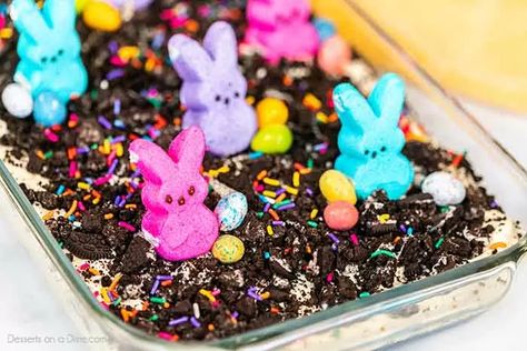 Easter dirt cake is an easy and delicious no bake treat perfect for dessert on Easter. This fun dessert is decorated with Easter peeps, candy and more. Easter Dirt Cake Recipe, Chocolate Dirt Cake, Dirt Pudding Recipes, Dirt Cake Recipe, Easter Dirt Cake, Chocolate Dirt, Oreo Dirt Cake, Dirt Cake Recipes, Easter Deserts