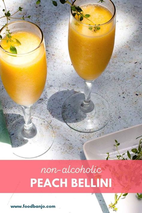 two drinks in champagne glasses Virgin Peach Bellini Recipe, Mocktails Non Alcoholic Peach, Peach Bellini Mocktail Recipe, Virgin Frozen Drinks, Virgin Drinks Non Alcoholic Recipes, Peach Drinks Non Alcoholic, Fancy Mocktails Non Alcoholic, Virgin Bellini, Peach Bellini Mocktail