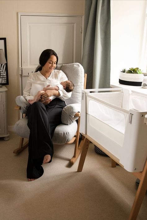 Mother calming her baby in a rocker. Grey nursery rocker and a white co-sleeping crib. Nursery inspiration. Enjoying the first few days. Moment of calm Chair Nursery, Wood Crib, Holiday Furniture, Bedside Crib, Wood Rocking Chair, Rocking Chair Nursery, Mattress Dimensions, Sleep Better, Crib Mattress