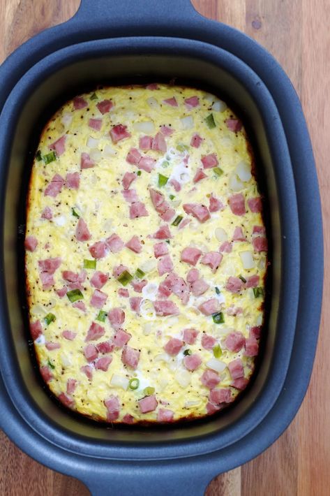 Farm Life Casserole--an easy slow cooker breakfast casserole with hashbrowns, ham, eggs and cheese. Breakfast Casserole With Hashbrowns Ham, Easy Slow Cooker Breakfast, Eggs In Crockpot, Ham Egg Bake, Ham And Hashbrown Casserole, Casserole With Hashbrowns, Breakfast Casserole With Hashbrowns, Ham And Egg Casserole, Egg And Cheese Casserole