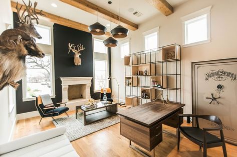 Mid-century meets modern in this home office, complete with trophy wall. #homeoffice #urbanologydesigns Hunting Room Office, Modern Trophy Room, Office With Deer Mounts, Deer Mounts In Living Room Modern, Hunting Office Decor, Modern Hunting Decor, Deer Head Decor Living Room Farmhouse, Trophy Rooms Hunting, Rustic Office Design