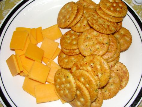 Cheddar cheese and crackers. Cheese And Cracker Lunch, Crackers And Cheese, Animal Cracker Aesthetic, Cheese Slice Crackers, Cheese And Crackers, Crackers And Cheese Aesthetic, Cheddar Cheese Aesthetic, Cheesit Crackers, Food Obsession